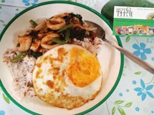 Hot basil stir fried with squid with a fried egg