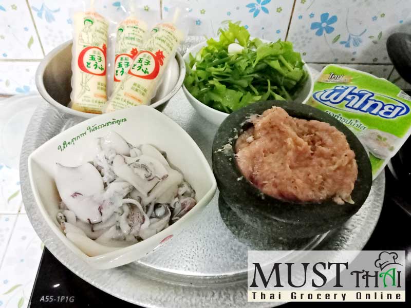Stuffed squid in plain soup with egg tofu