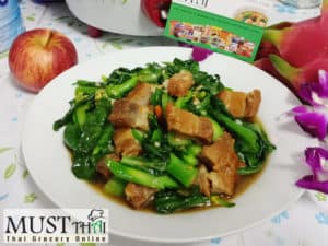 Stir fried Chinese kale with crispy pork