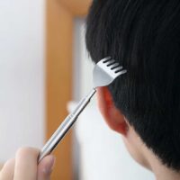 Stainless telescoping back scratcher